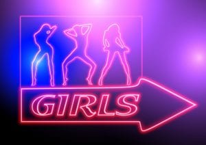 Neon sign saying "Girls"