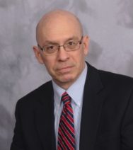 Headshot of attorney John English
