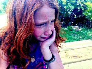 Young girl crying
