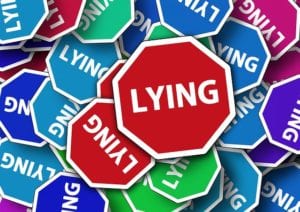 Signs saying "Lying"