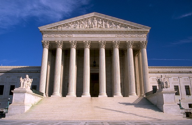 A close up of the front of the US Supreme Court building.