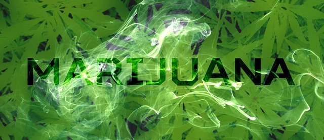 A picture pot pot leaves, overlaid with smoke, and the word 'marijuana' spelled in capital letters